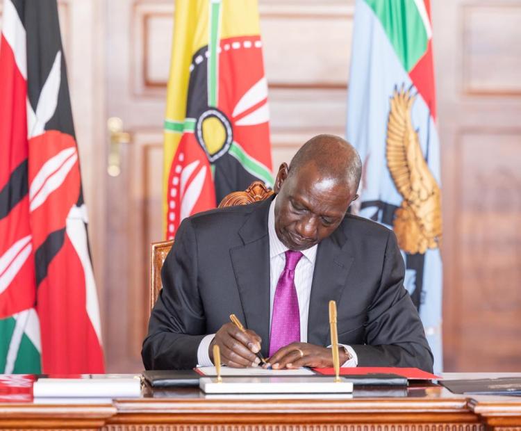 President Signing the DRM Bill